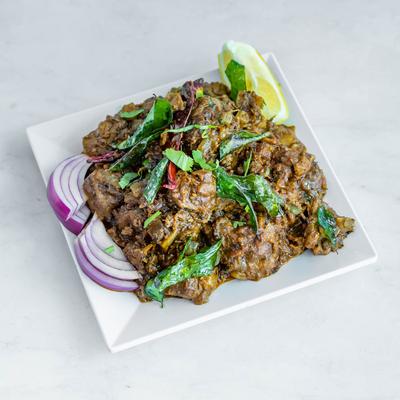 Lamb cooked in peri peri sauce