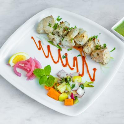 Boneless chicken marinated in cream and spices